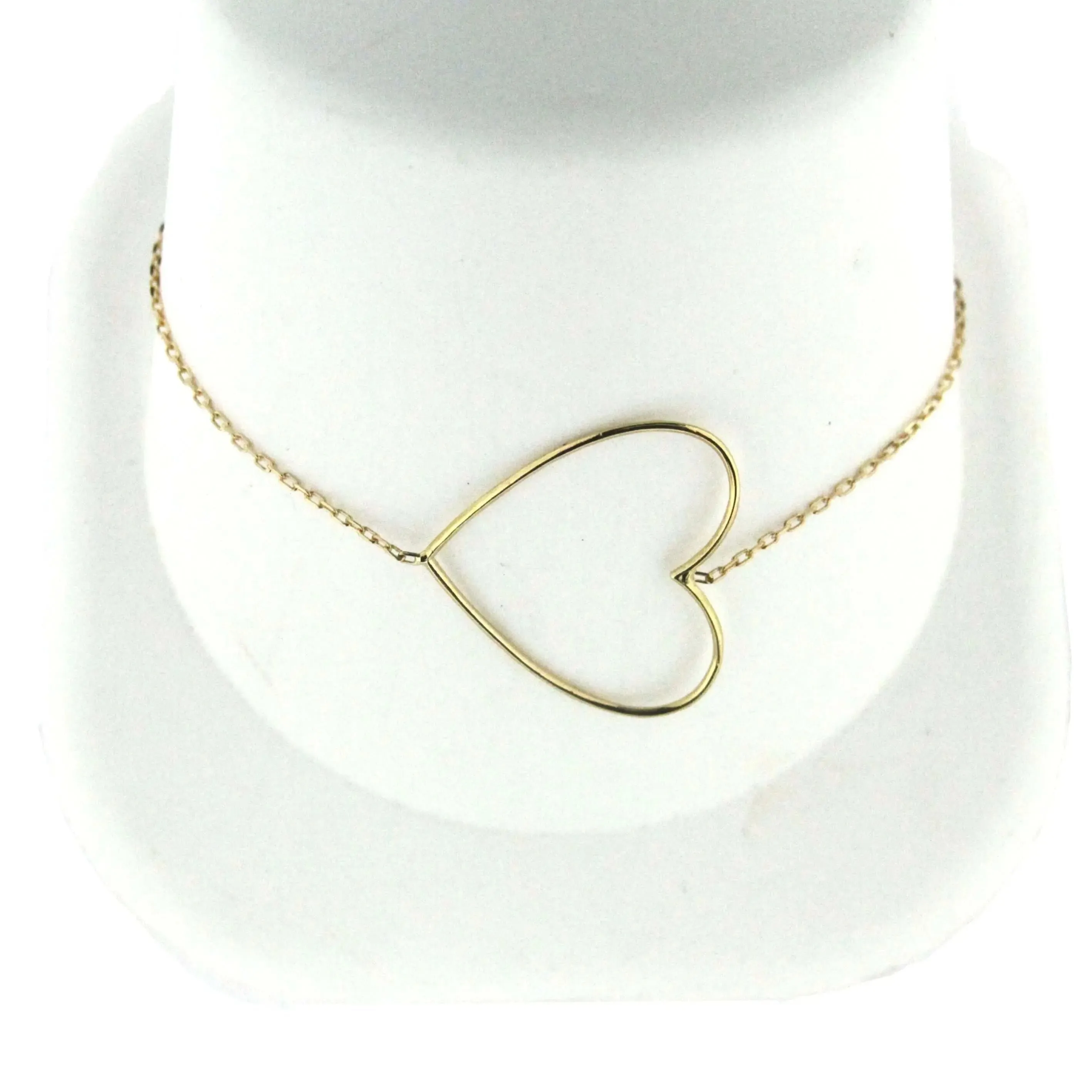 18kt Yellow gold open Heart  bracelet 7 inches with extra rings staring at 6.5