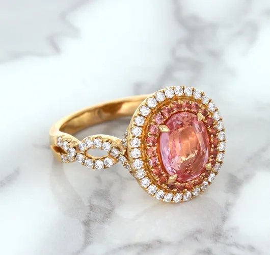 2.07ct. Oval Padparadscha Ring with Sapphire and Diamond Halo in 18K Rose Gold