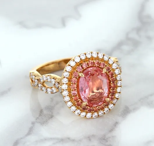 2.07ct. Oval Padparadscha Ring with Sapphire and Diamond Halo in 18K Rose Gold