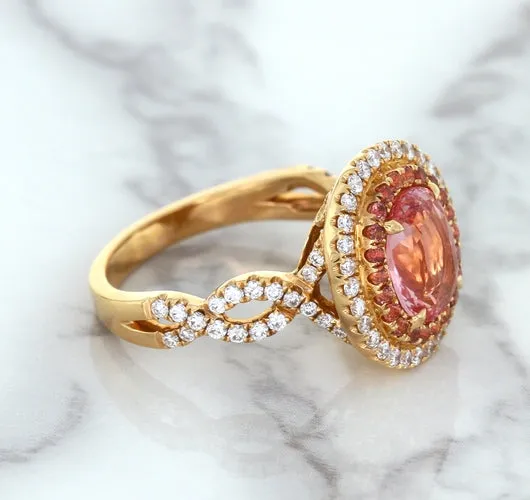 2.07ct. Oval Padparadscha Ring with Sapphire and Diamond Halo in 18K Rose Gold