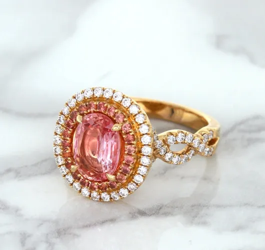 2.07ct. Oval Padparadscha Ring with Sapphire and Diamond Halo in 18K Rose Gold