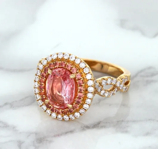 2.07ct. Oval Padparadscha Ring with Sapphire and Diamond Halo in 18K Rose Gold
