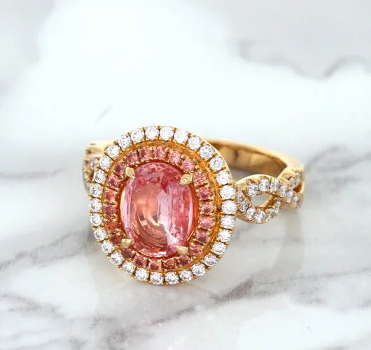 2.07ct. Oval Padparadscha Ring with Sapphire and Diamond Halo in 18K Rose Gold
