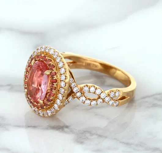 2.07ct. Oval Padparadscha Ring with Sapphire and Diamond Halo in 18K Rose Gold