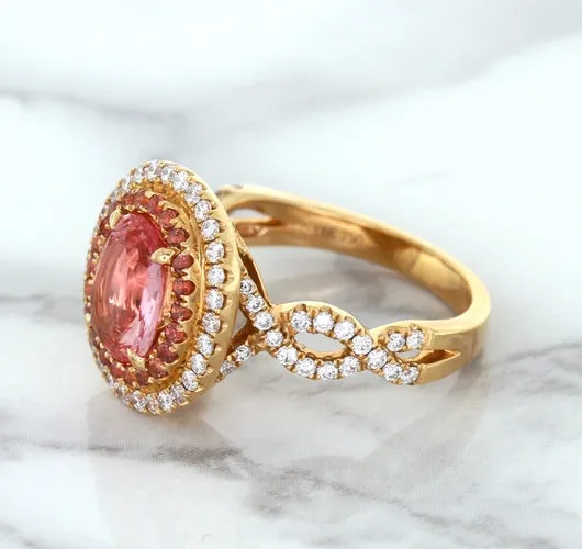 2.07ct. Oval Padparadscha Ring with Sapphire and Diamond Halo in 18K Rose Gold