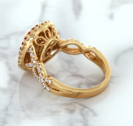 2.07ct. Oval Padparadscha Ring with Sapphire and Diamond Halo in 18K Rose Gold