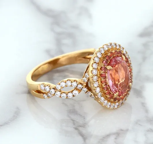 2.07ct. Oval Padparadscha Ring with Sapphire and Diamond Halo in 18K Rose Gold