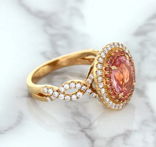 2.07ct. Oval Padparadscha Ring with Sapphire and Diamond Halo in 18K Rose Gold