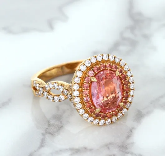 2.07ct. Oval Padparadscha Ring with Sapphire and Diamond Halo in 18K Rose Gold
