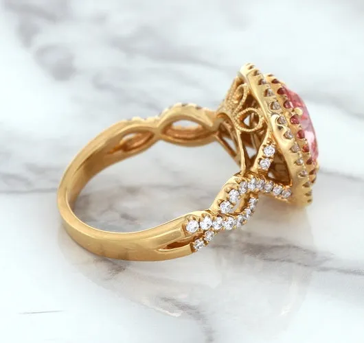 2.07ct. Oval Padparadscha Ring with Sapphire and Diamond Halo in 18K Rose Gold