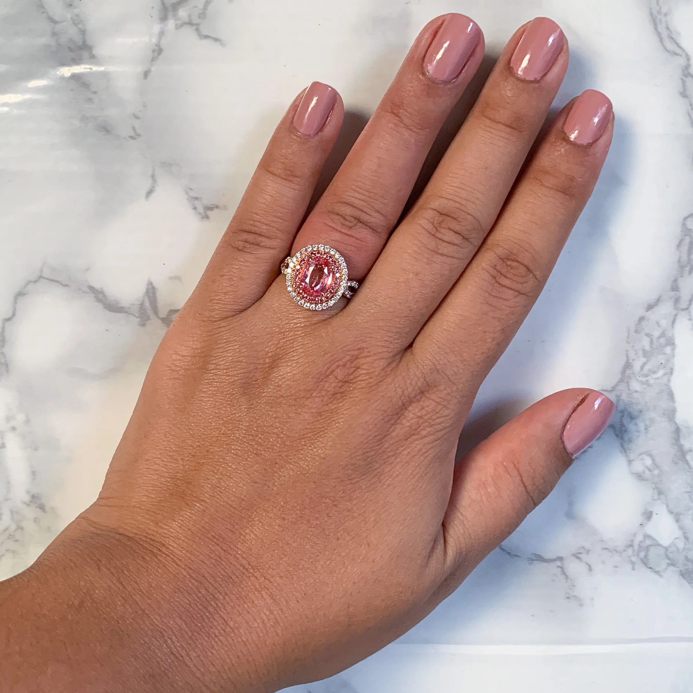 2.07ct. Oval Padparadscha Ring with Sapphire and Diamond Halo in 18K Rose Gold
