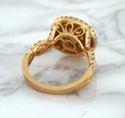2.07ct. Oval Padparadscha Ring with Sapphire and Diamond Halo in 18K Rose Gold