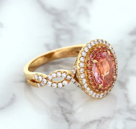 2.07ct. Oval Padparadscha Ring with Sapphire and Diamond Halo in 18K Rose Gold
