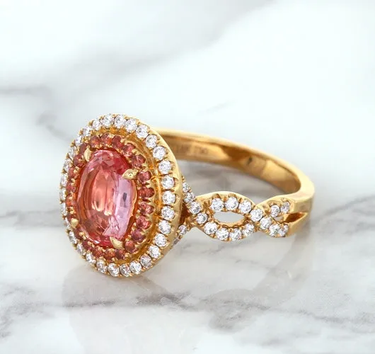 2.07ct. Oval Padparadscha Ring with Sapphire and Diamond Halo in 18K Rose Gold
