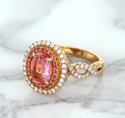 2.07ct. Oval Padparadscha Ring with Sapphire and Diamond Halo in 18K Rose Gold