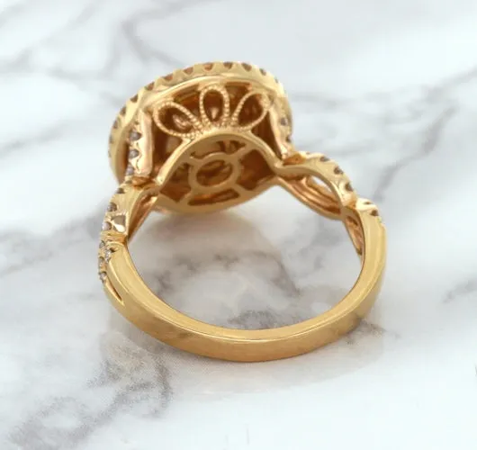 2.07ct. Oval Padparadscha Ring with Sapphire and Diamond Halo in 18K Rose Gold