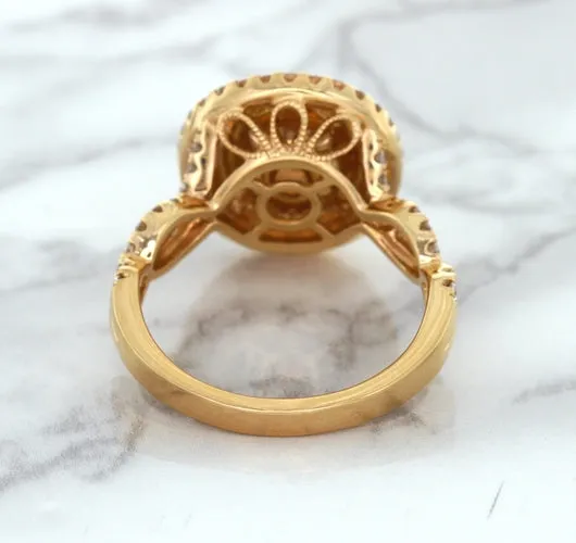 2.07ct. Oval Padparadscha Ring with Sapphire and Diamond Halo in 18K Rose Gold