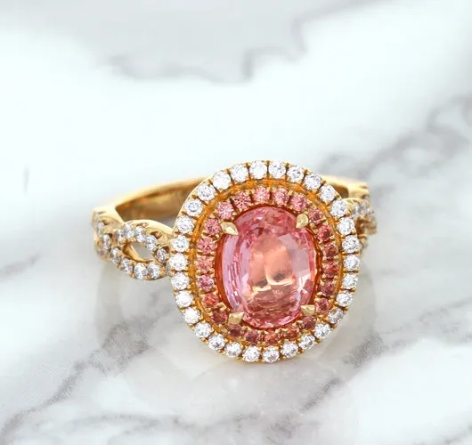 2.07ct. Oval Padparadscha Ring with Sapphire and Diamond Halo in 18K Rose Gold