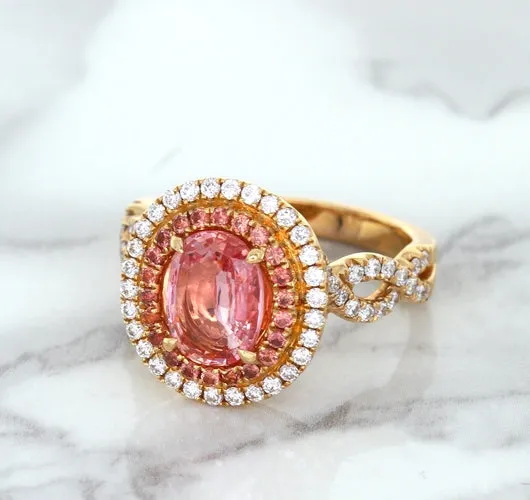 2.07ct. Oval Padparadscha Ring with Sapphire and Diamond Halo in 18K Rose Gold