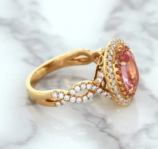 2.07ct. Oval Padparadscha Ring with Sapphire and Diamond Halo in 18K Rose Gold