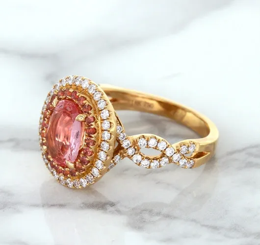2.07ct. Oval Padparadscha Ring with Sapphire and Diamond Halo in 18K Rose Gold