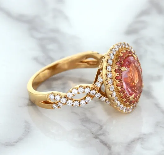 2.07ct. Oval Padparadscha Ring with Sapphire and Diamond Halo in 18K Rose Gold