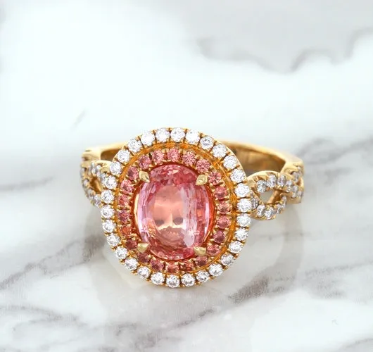 2.07ct. Oval Padparadscha Ring with Sapphire and Diamond Halo in 18K Rose Gold
