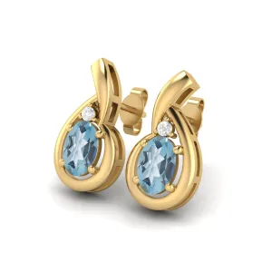 6x4mm Oval Shape Blue Topaz Studs 9k Yellow Gold Teardrop Earrings