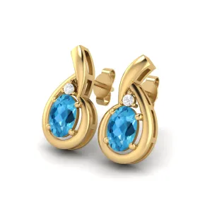 6x4mm Oval Shape Swiss Blue Topaz Studs 9k Yellow Gold Teardrop Earrings