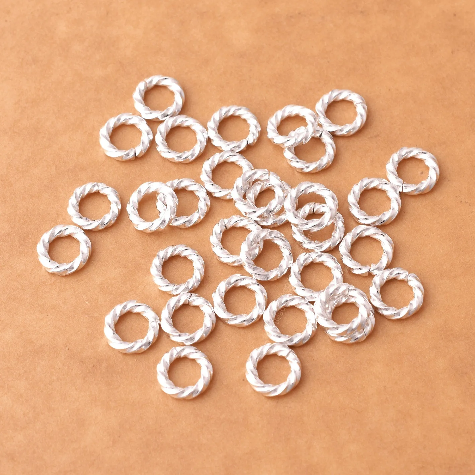 8mm - Silver Plated Open Twisted Wire Jump Rings