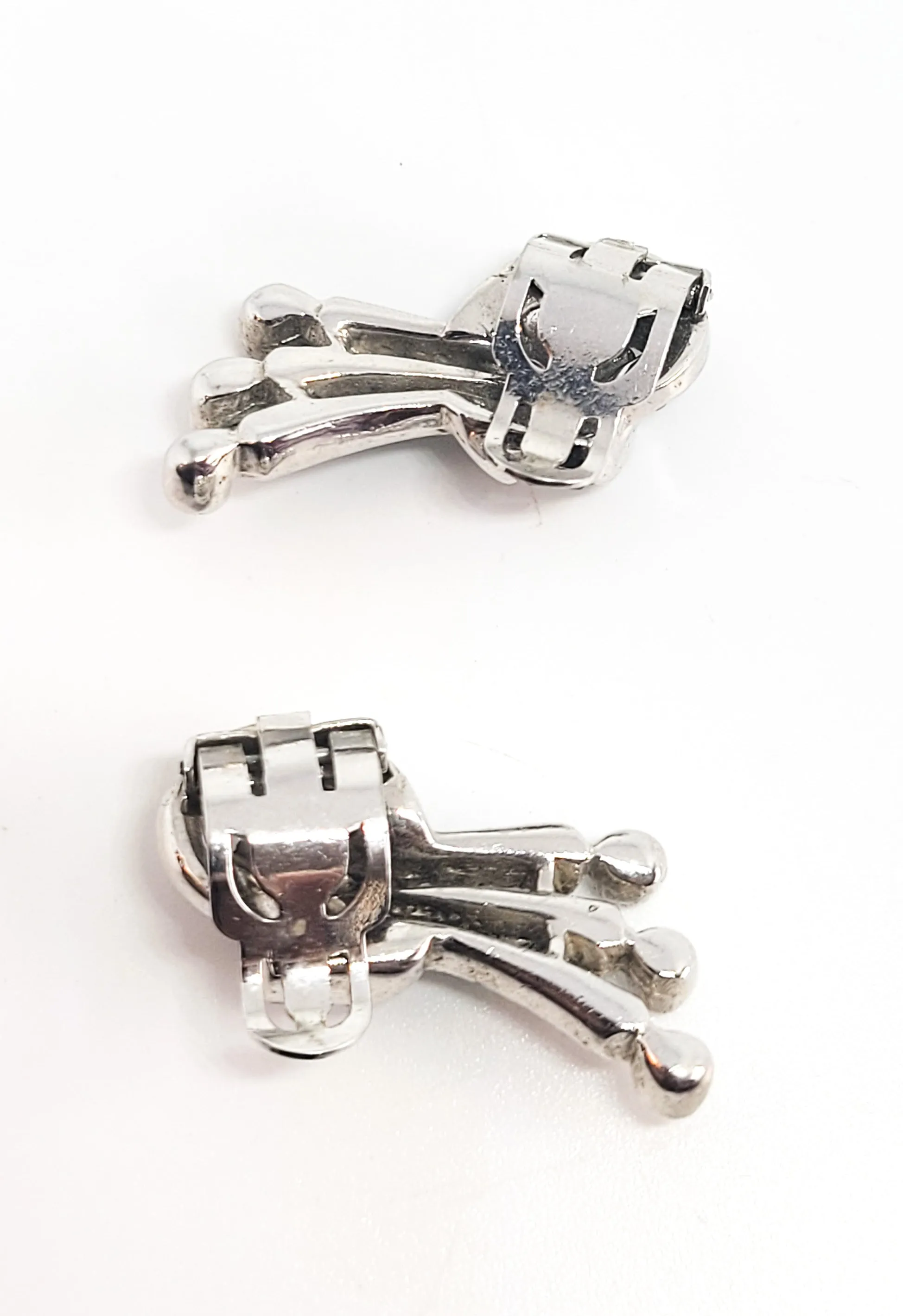 Art Deco pot metal rhodium plated clear rhinestone climber vintage clip on earrings