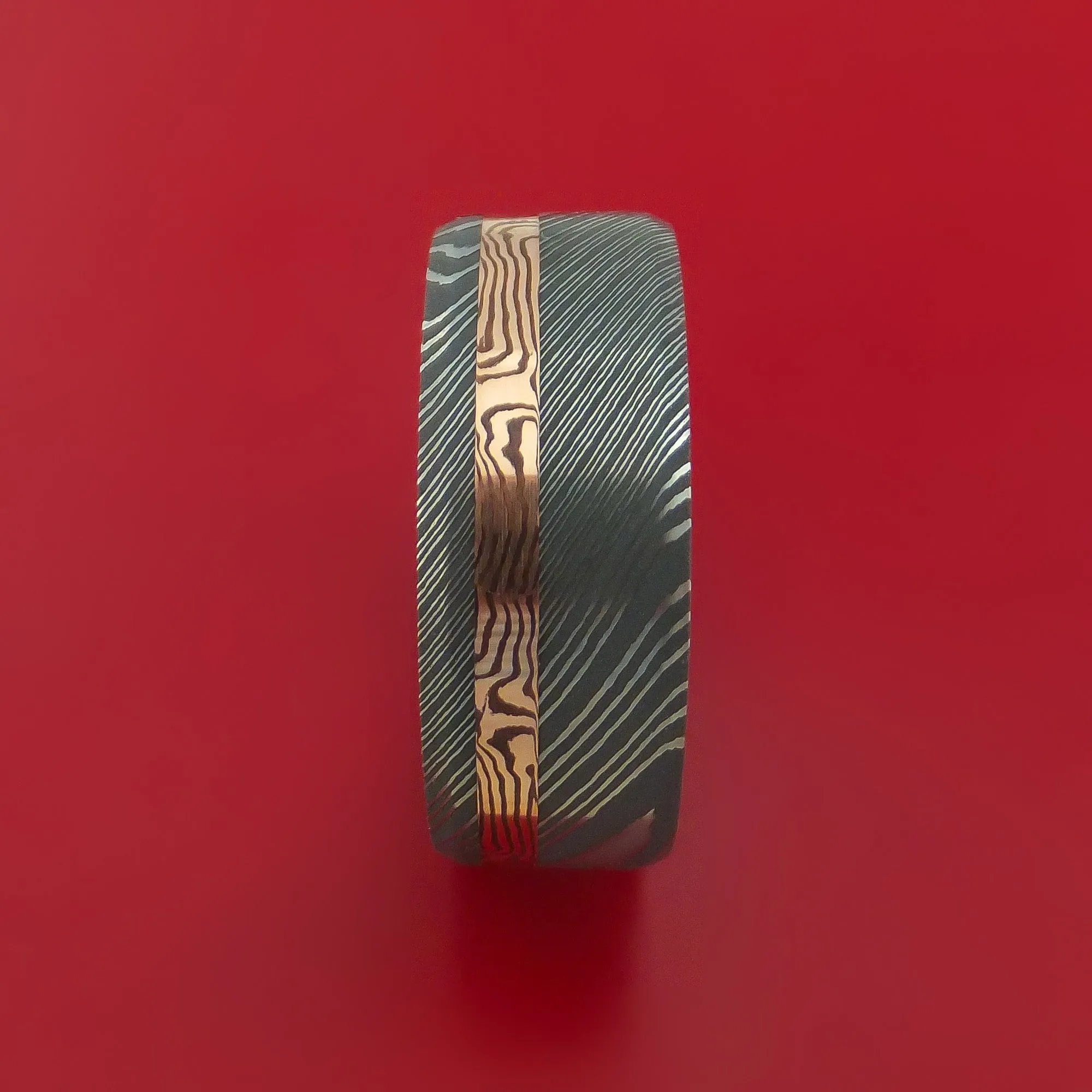 Damascus Steel Ring with 14k Rose Gold Mokume Shakudo Inlay and Interior Hardwood Sleeve Custom Made Band