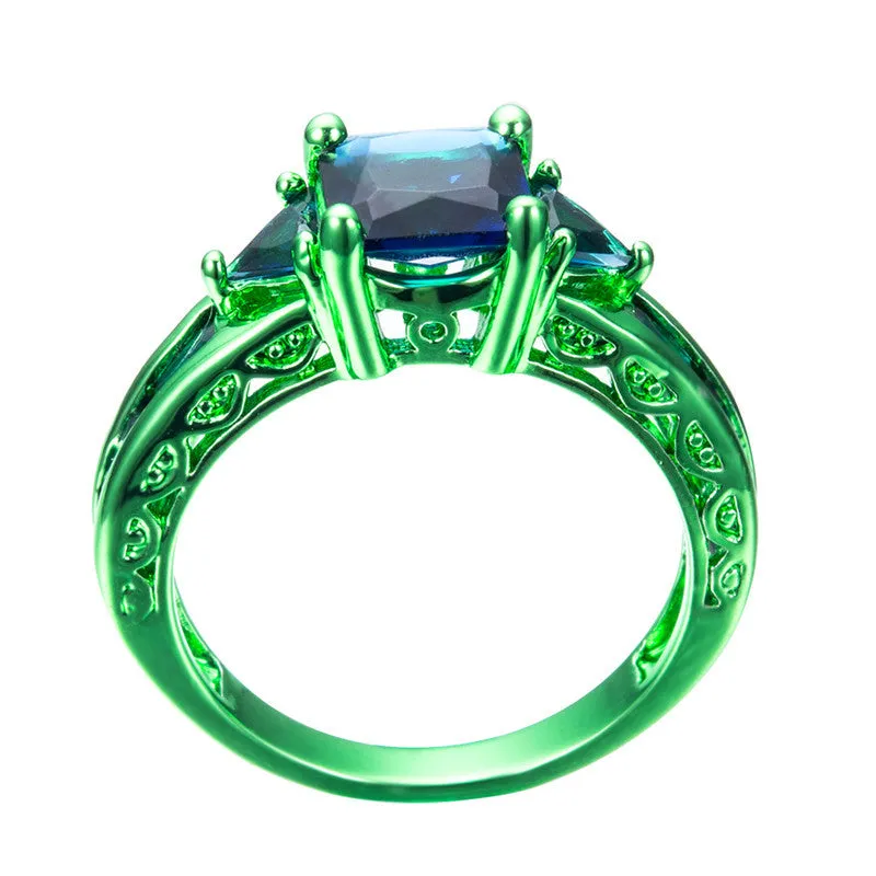 Green Gold Cosmic Blue Zircon Ring