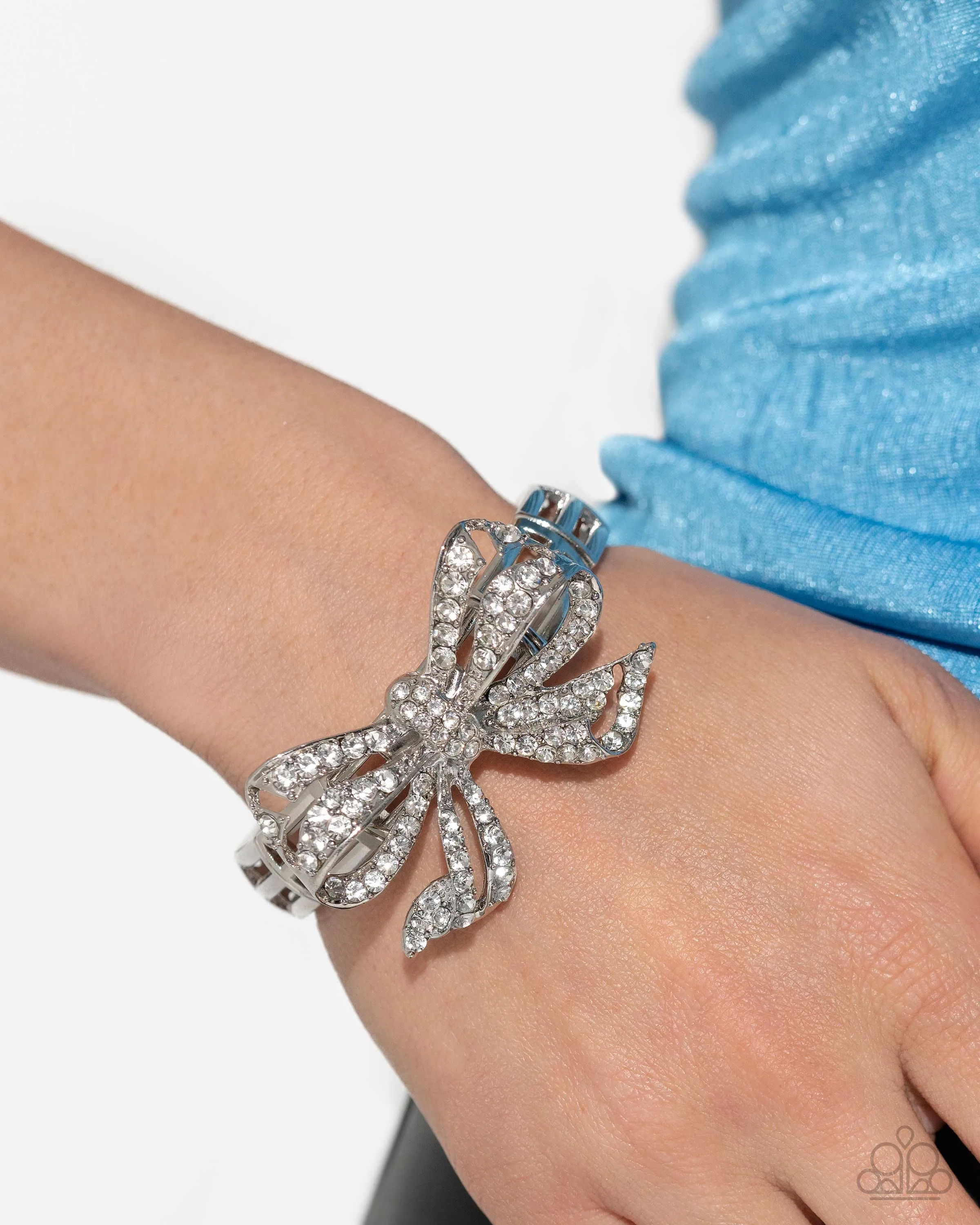 Its All A-BOW-t Me - White - Rhinestone Paparazzi Stretchy Bracelet -  May 2024 Life of the Party Exclusive