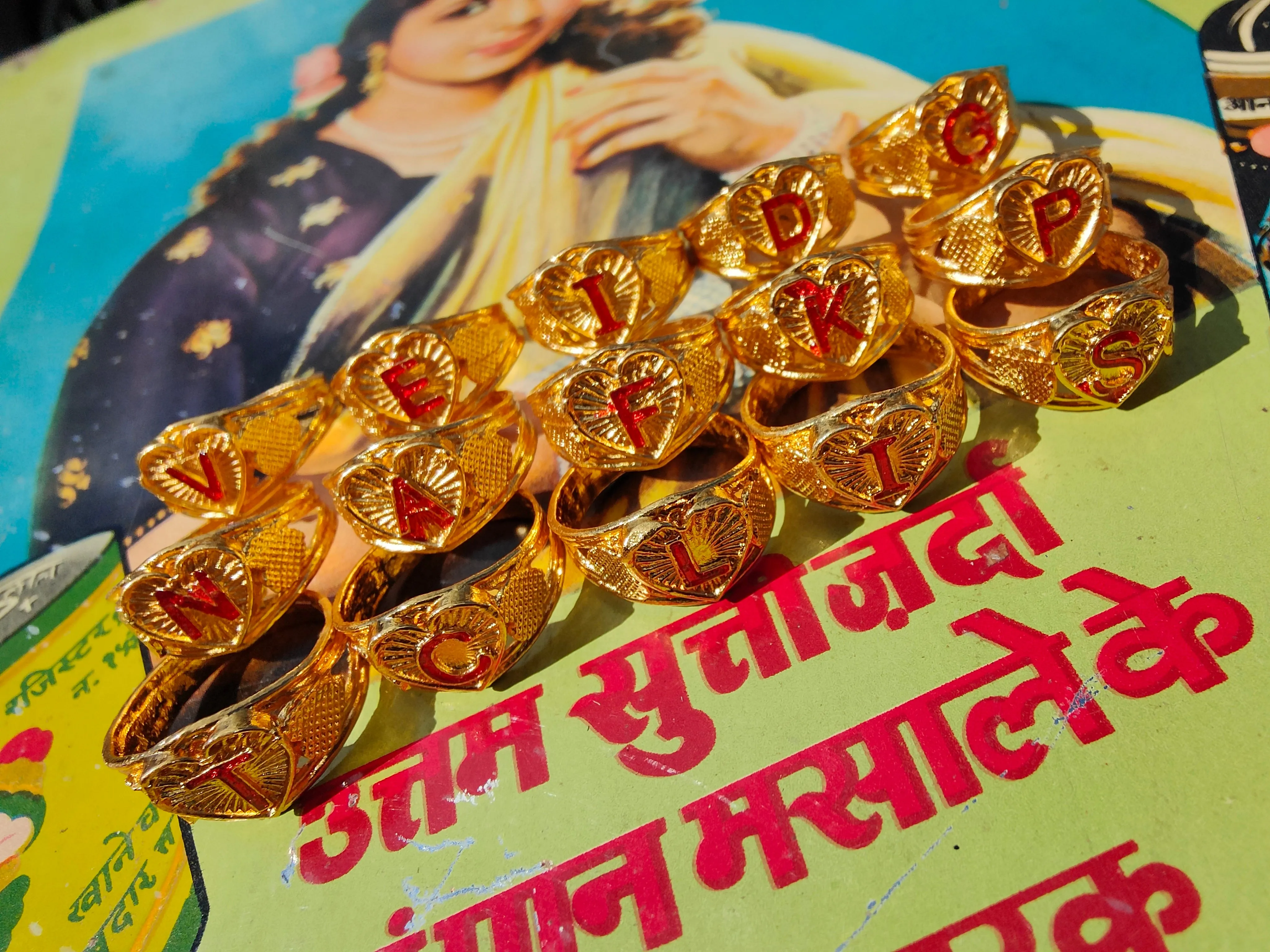 Kitsch Indian initial heart rings