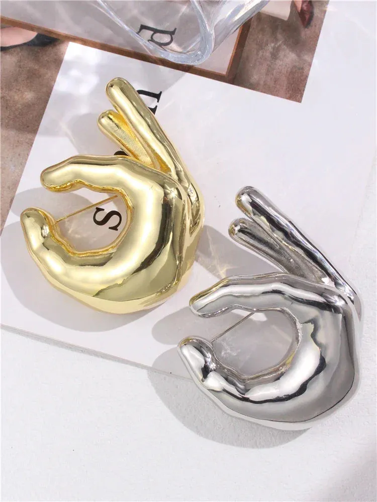 Metal Pinching Hand Brooches