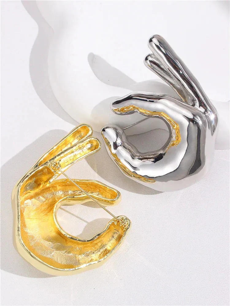 Metal Pinching Hand Brooches
