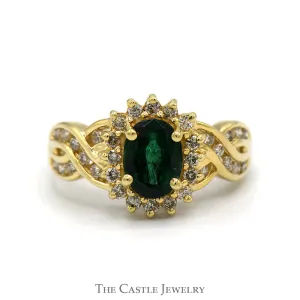 Oval Cut Emerald Ring with Diamond Halo and Channel Set Diamond Accented Twisted Sides in 14k Yellow Gold