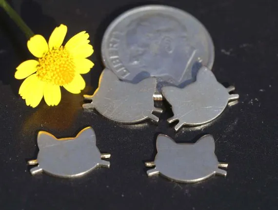Tiny metal Cat Head blanks